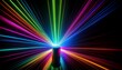 © Sam - a cylindrical object illuminated by vibrant radiating laser beams of diverse colors creates a dynamic captivating visual display against a stark black backdrop