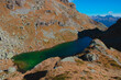 © Gherzak - Stunning autumnal view of the mountain lake Lago Campelli Basso, along the Alpine route Giro dei 5 Laghi di Valgoglio, Orobie Alps, Lombardy, Italy