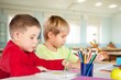 © BillionPhotos.com - Smiling children students sitting in class room