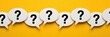 © Fahad - Series of white speech bubbles with question marks on a bright yellow background, representing inquiry and uncertainty