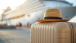 © Bella - Close-up of a stylish straw hat resting on a beige suitcase with a luxury cruise ship in the background, symbolizing travel, vacation, adventure, and summer holiday lifestyle by the sea