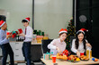 © laddawan - Christmas party! Festive decor, Santa hats, gifts, food, and cheerful coworkers bring joy and togetherness this holiday season