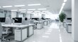 © Arif - A blurred view of a modern open plan office workspace interior