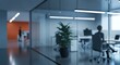 © Arif - Modern office interior with blurred figures and glass partition walls view