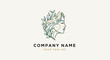 © Anak - Elegant line art logo of a womans face with natural leaves for hair.