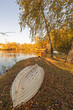 © Андрей Иванов - overturned boat is lying on the shore of a pond in autumn