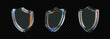 © Tuba Reza - Set of 3D transparent glass shield icon with holographic gradient and light refraction effects on a dark background. Modern security, privacy protection, and data defense symbol.