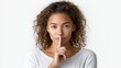 © Salander Studio - studio portrait of a woman making a quiet gesture with a finger on her lips