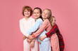 © New Africa - Cute children in pajamas on pink background