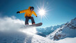 © Vadym - A young man snowboarder jumps in fresh snow on a sunny winter day. He wears a helmet, goggles, yellow jacket. High snow mountains are under a clear blue sky. This winter sport is thrilling.