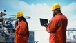 © DC Studio - Offshore platform crew using artificial intelligence program on laptop to optimize drilling operations. African american coworkers analyzing geology data using AI tech on notebook,