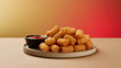© ArpPSIqee - A plate of golden-brown tater tots served with a side of red dipping sauce on a neutral surface against a gradient background.