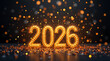 © Annisa - Illuminated golden numbers 2026 sparkle against a dark background, celebrating the new year.