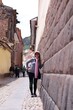 © Esdras Rojas - Smiling Traveler Enjoying a Sunny Day in Cusco