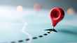 © perfectlab - A red pin is stuck in a map, marking the destination of an important journey or project. The background features blurred images that suggest movement and progress towards this goal.