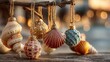 © Ai7 - tropical christmas concept. Seashell decorations hanging with a blurred background of lights.