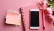 © RHONDA - pink smartphone pen sticky note and flower on pink notebook