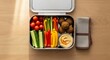© Роман Соловьев - Healthy plant-based diet meal prep in stainless steel lunch box for sustainable living