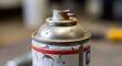 © Nataly - Rusty Spray Can with Clogged Nozzle Close-Up for Repair Blogs, Industrial Safety Websites, Equipment Maintenance Guides, Metalworking Articles, and Environmental Awareness