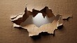 © Phichitpon - Torn Brown Paper with Sneak Peek Effect.