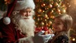 © Renat - Santa Claus giving gift to happy child under glowing Christmas tree