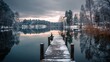© Pavel - Winter lake scenery with snow-covered dock and calm water reflecting cloudy skies during sunset