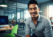 © Metehan - Portrait of smiling asian business man modern office interior startup employee pride and motivation concept