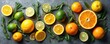 © Maryna - Vibrant arrangement of fresh citrus fruits, aromatic rosemary sprigs on dark grey background. Whole oranges, lemons, limes mixed with bright colorful slices. Natural healthy food for diet, cooking,