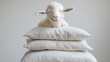 © Robert - Stuffed goat with a stitched smile leaning on a stack of pillows
