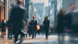© Nuchylee - Blurry city street with people walking quickly, showcasing busy urban atmosphere filled with motion and energy