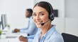 © BlackCat - A call center representative wearing a headset, smiling while providing friendly customer support, positive and welcoming facial expression, professional workplace setting, smooth soft-focus backgroun