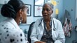 © soem - An elderly woman in a white lab coat talking to a young woman in a white lab coat in a medical office