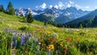 © Snabil - Alpine meadow bursts with wildflowers beneath snow-capped peaks and a radiant summer sky.