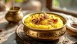 © nabila - Golden Rice Pudding Topped with Nuts and Seeds Served in an Ornate Brass Bowl with Soft Sunlight Streaming from a Window