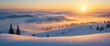 © Hanuman - Winter mountain landscape with snow and fog at sunrise or sunset under a cloudy sky.