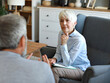 © Lumos sp - Portrait of a senior mature or mid aged woman doctor psychiatrist during session with her patient in her office in clinic