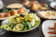 © Creative Light - Fresh salad with avocado and blackberries on a plate, close-up shot