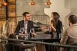 © Creative Light - Business colleagues in a restaurant having a meeting and discussion