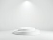 © Ylstudiobd - Minimalist white stage podium with spotlight for product display