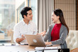 © Fahng - Call center, manager and happy team at computer for software training, customer service and CRM in office. Man, woman and sales mentor helping intern on desktop, telemarketing and technical support.