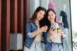 © itchaznong - Friendship and Fun. Two young women enjoying coffee and sharing a moment.