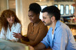 © alvaro - Diverse business team collaborating during office discussion