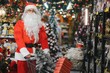 © Serhii - Santa claus shopping for christmas decorations and presents