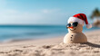 © syhin_stas - Playful sand snowman with sunglasses and Santa hat on sunny tropical beach with blue sky and sea, cheerful holiday spirit in a seaside Christmas setting