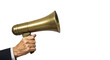 © khafid - A powerful image of a hand gripping a classic golden megaphone, symbolizing voice, communication, and important announcements on a sleek dark
