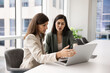 © fizkes - Diverse young female colleagues working on project together