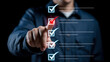 © IMAGES HUB - A person is touching a digital checklist with a red checkmark, highlighting task completion, validation, and confirmation of items on a list in a modern interface