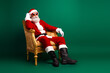 © deagreez - Stylish Santa Claus in a trendy suit relaxing on an ornate chair with a green festive background spreading cheerful vibes