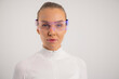 © kjekol - Futuristic woman wearing smart glasses