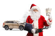© Ljupco Smokovski - Car crash and Santa Claus with arm injury wearing a sling and holding money
